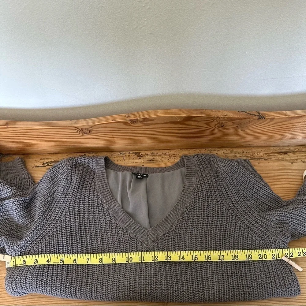 Torrid gray v-neck sweater.